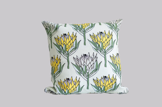 King Protea Yellow on Mint cushion cover.